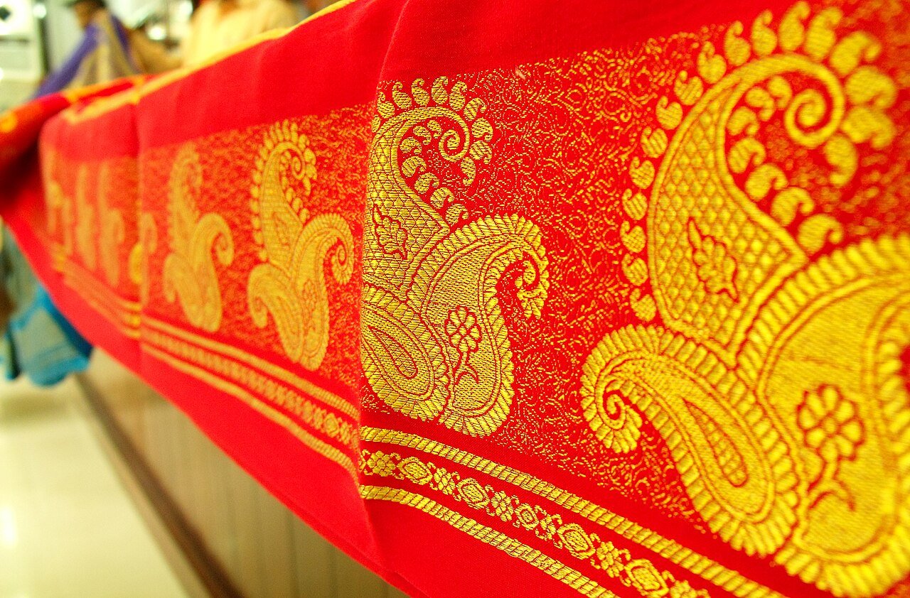 A richly coloured Mysore silk saree with gold zari border